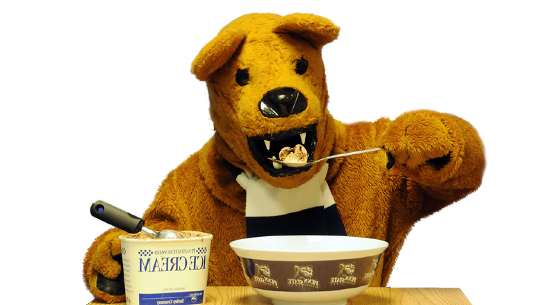 The Nittany Lion mascot digs in to a bowl of Berkey Creamery Ice Cream