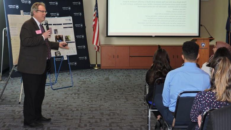 professor presenting to group